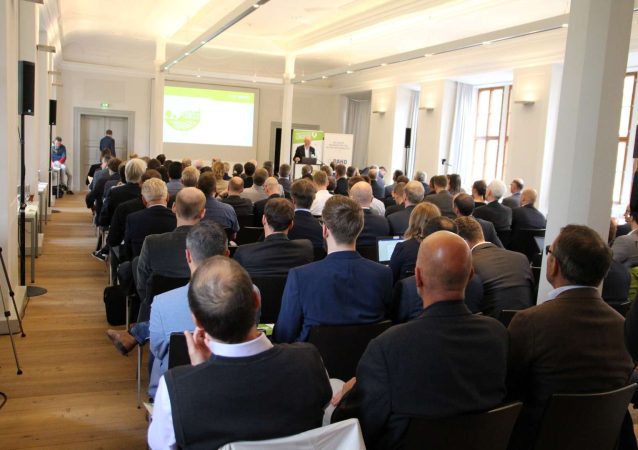 Teilnehmer hören einen Vortrag auf dem 5. SCL Kongress